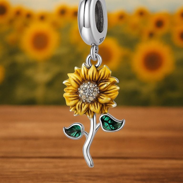 Gele zonnebloem met groene bladeren, versierd met sprankelende stenen.